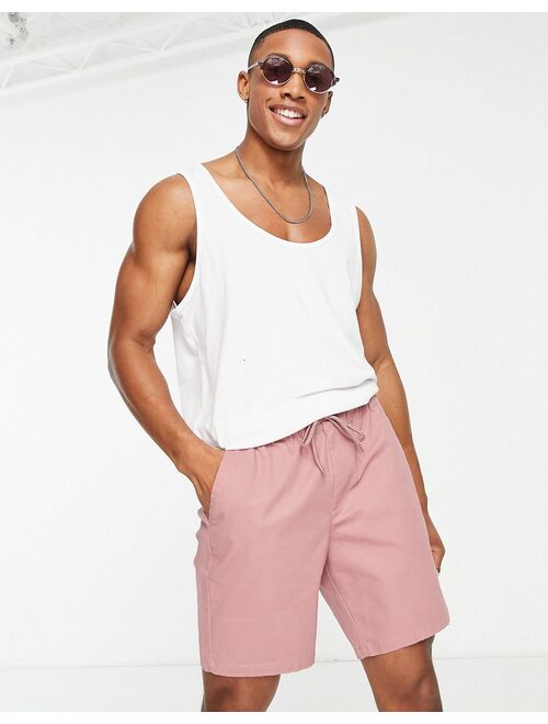 ASOS DESIGN skinny chino shorts with elastic waist in pink