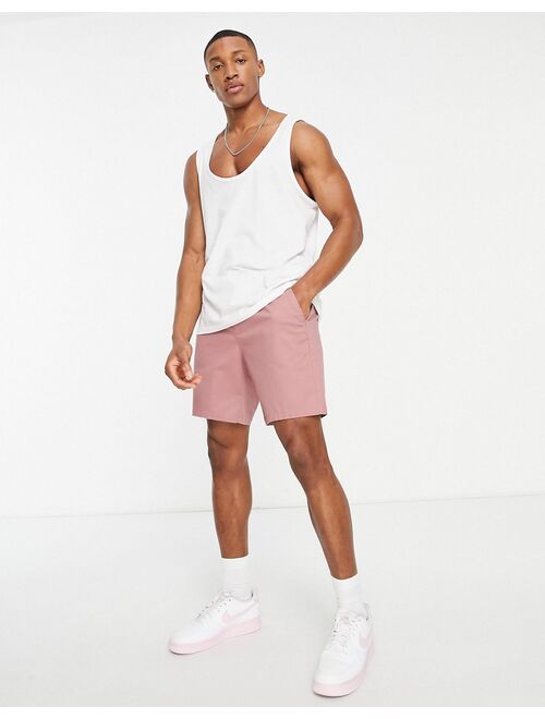 ASOS DESIGN skinny chino shorts with elastic waist in pink