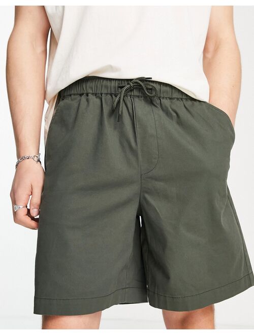 ASOS DESIGN boxy chino shorts in dark green