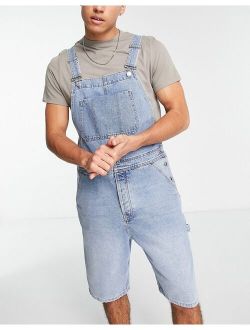 denim overall shorts in mid wash