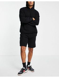 oversized knitted shorts in black