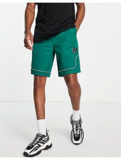 longline basketball short in green