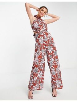 halterneck cut out jumpsuit in floral print