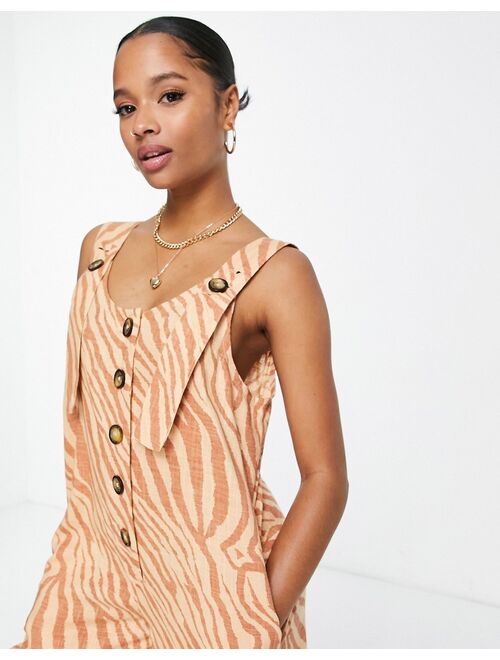 ASOS Petite ASOS DESIGN Petite linen button strap jumpsuit in animal print