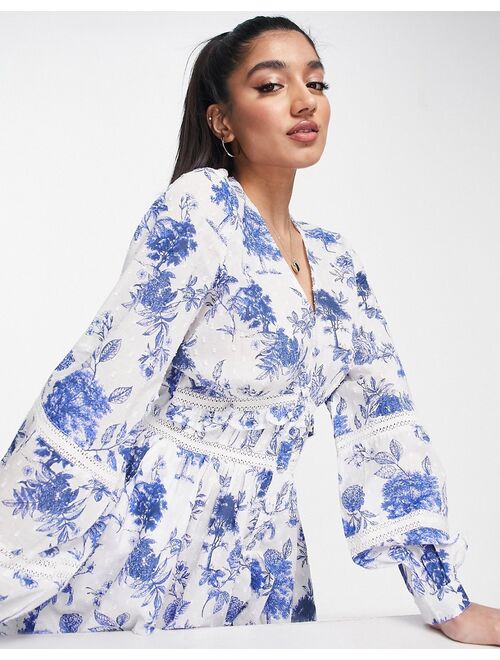 ASOS DESIGN lace insert tea romper in blue and white floral print