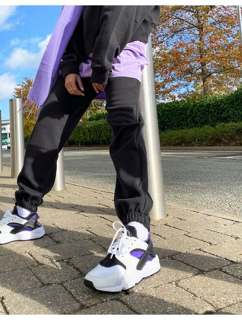 Nike Air Huarache sneakers in white/electro purple