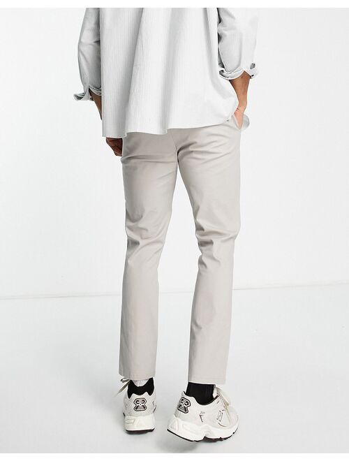 ASOS DESIGN skinny chinos with pin tuck and elasticized waist in stone