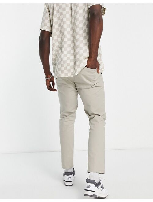 ASOS DESIGN slim chinos with pin tucks and elasticated waist in light beige