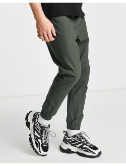 tapered chino joggers with elastic waist in dark green