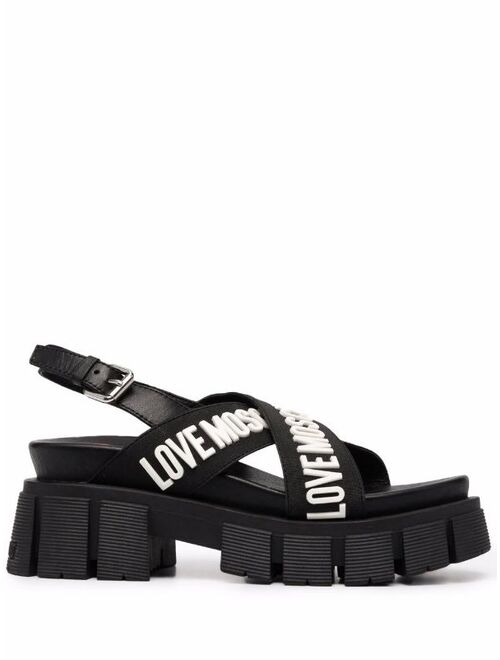 Love Moschino crossover logo strap sandals