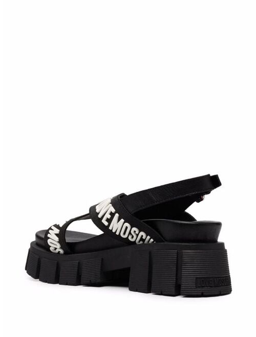 Love Moschino crossover logo strap sandals