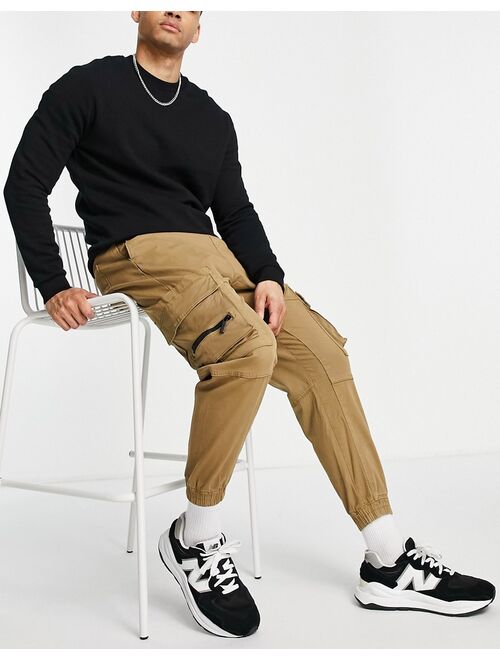 Bershka cargo pants in beige