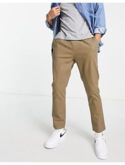 slim chinos with elasticized waist in brown