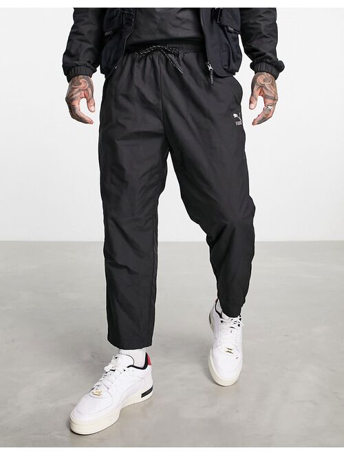 Puma logo quilted pants in black exclusive to ASOS