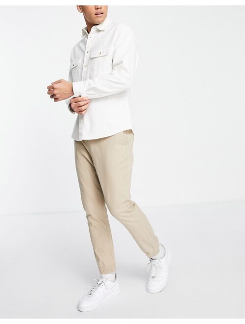 ASOS DESIGN tapered chino sweatpants in beige