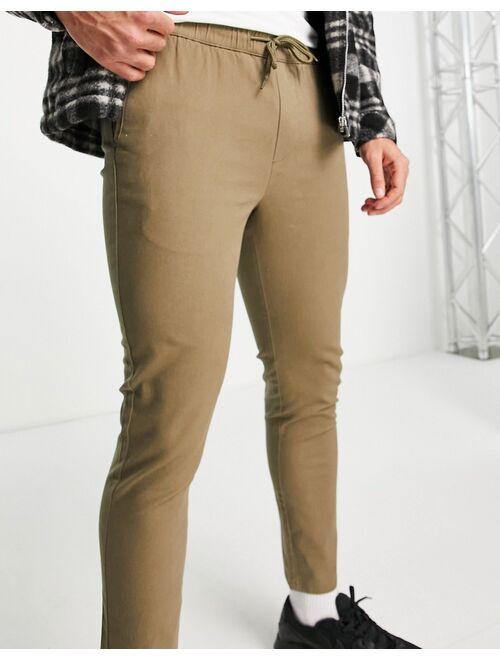ASOS DESIGN skinny chinos with elasticated waist in brown