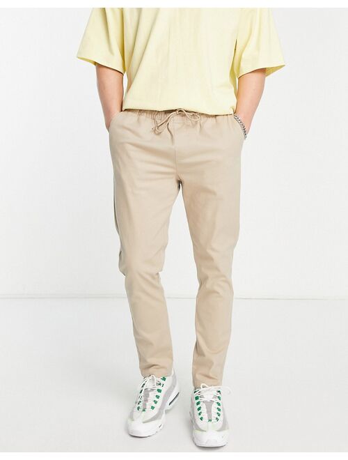 ASOS DESIGN skinny chinos with elasticated waist in beige