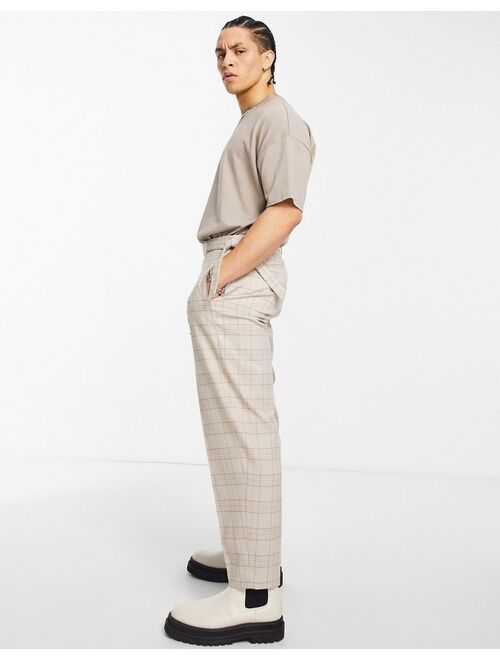 ASOS DESIGN tapered smart pants with pink highlight plaid