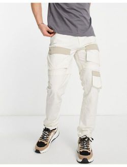 skinny cargo pants with elasticated cuff in off white