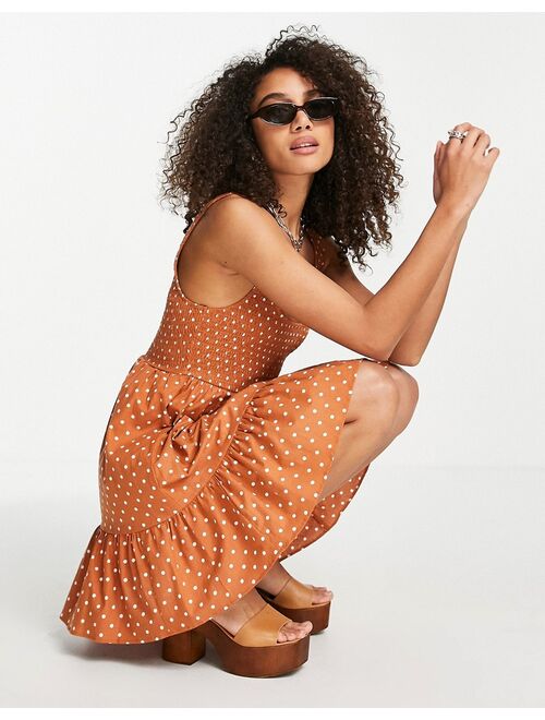 ASOS DESIGN shirred mini sundress with tiers in rust spot print