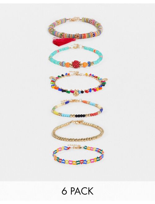 ASOS DESIGN pack of 6 anklets in multicolour beads with tassel and shell charms in gold tone