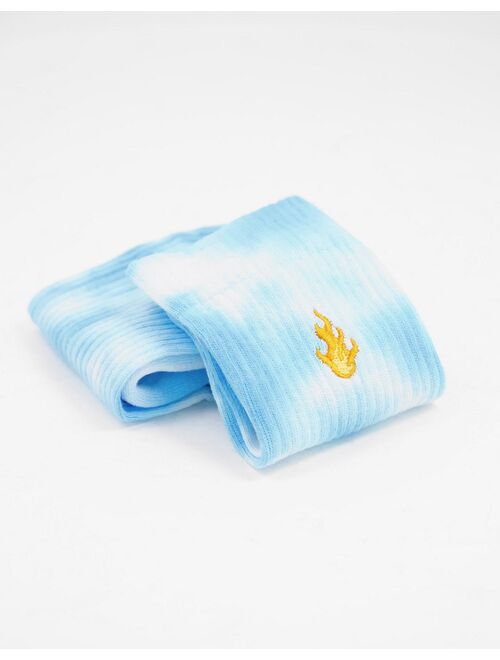 ASOS DESIGN blue tie dye sports sock with flame embroidery