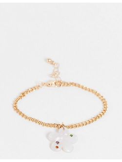 chain bracelet with hot fix crystal flower in gold tone
