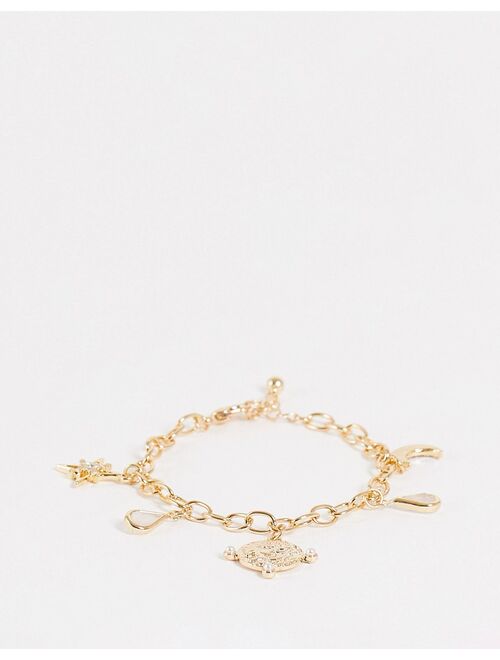 ASOS DESIGN bracelet with celestial charms in gold tone