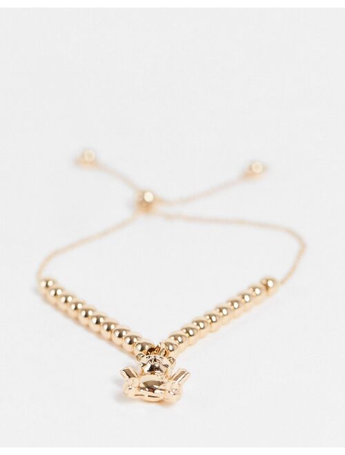 ASOS DESIGN bracelet with teddy bear charm in gold tone
