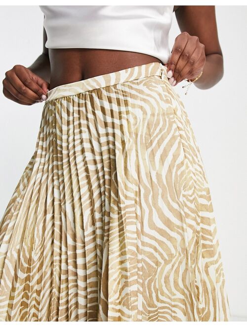 ASOS DESIGN satin plisse ringpleated midi skirt in beige and white zebra print