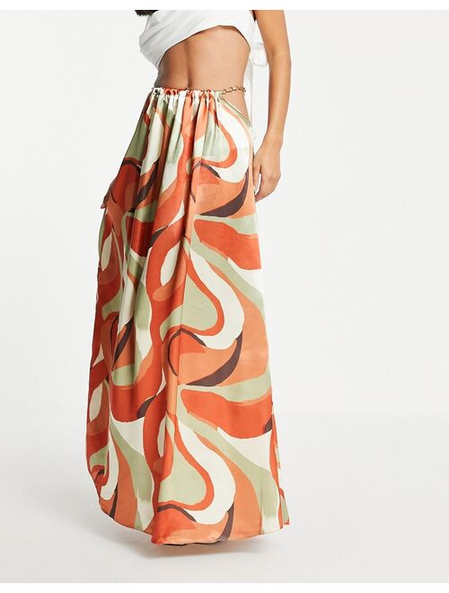 ASOS DESIGN satin midaxi skirt with chain detail in swirl print