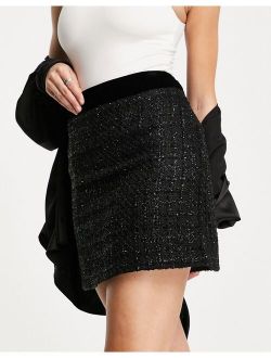 boucle mini skirt in black - part of a set