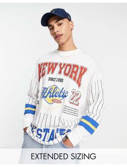 oversized long sleeve T-shirt with varsity badge prints in white