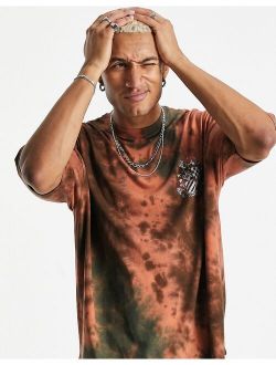 oversized t-shirt in green and orange tie dye with front print