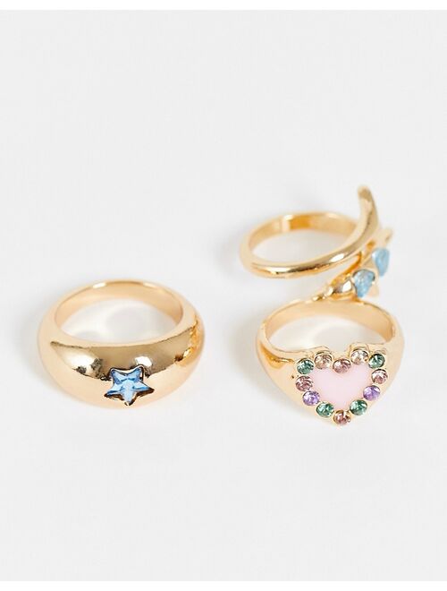 Reclaimed Vintage Inspired 3 ring pack in gold with dolphin & heart