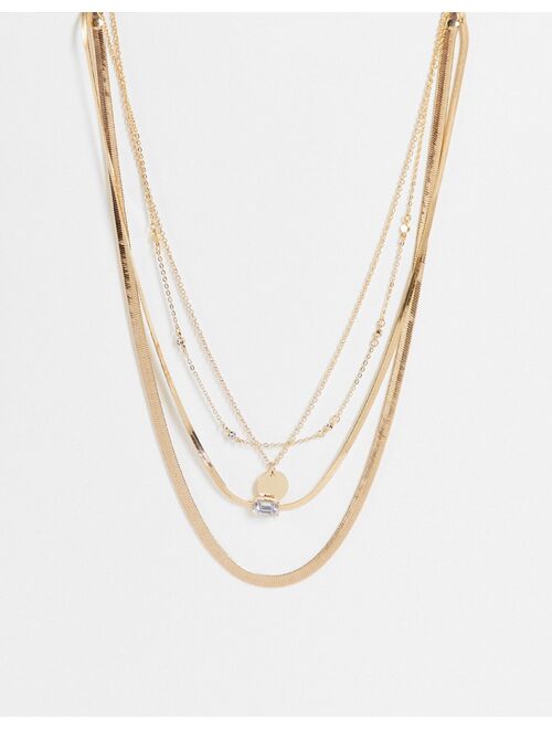 ASOS DESIGN multi row necklace with crystal design in gold tone