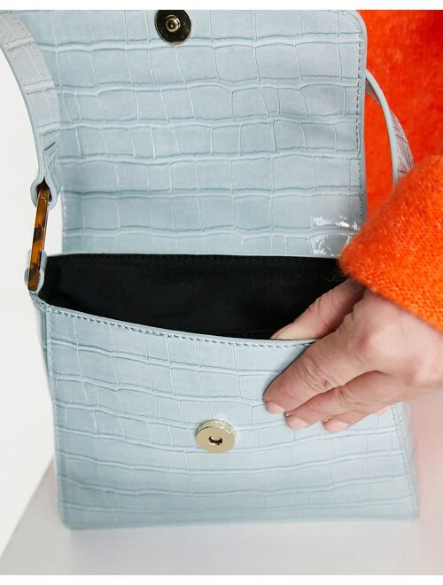 ASOS DESIGN curved flap shoulder bag with resin in link in blue croc