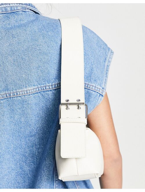ASOS DESIGN oversized buckle detail shoulder bag in off white
