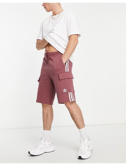 adidas Originals adicolor three stripe cargo shorts in quiet crimson