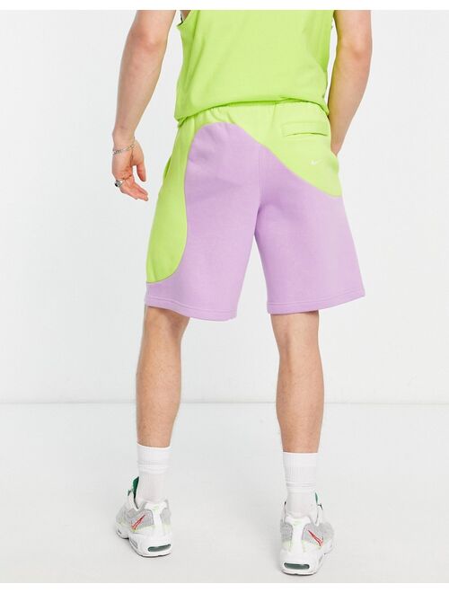 Nike Color Clash colorblock shorts in lime