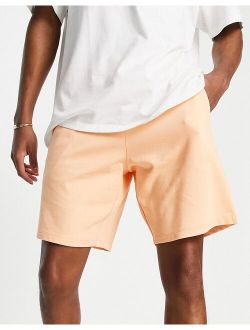 oversized jersey shorts in washed orange