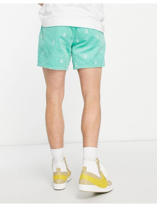 ASOS DESIGN slim shorts with peace embroidery in mint cord