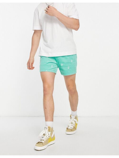 ASOS DESIGN slim shorts with peace embroidery in mint cord