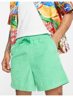 wide shorts in bright green cord