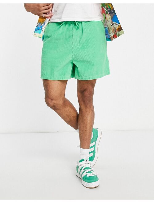 ASOS DESIGN wide shorts in bright green cord