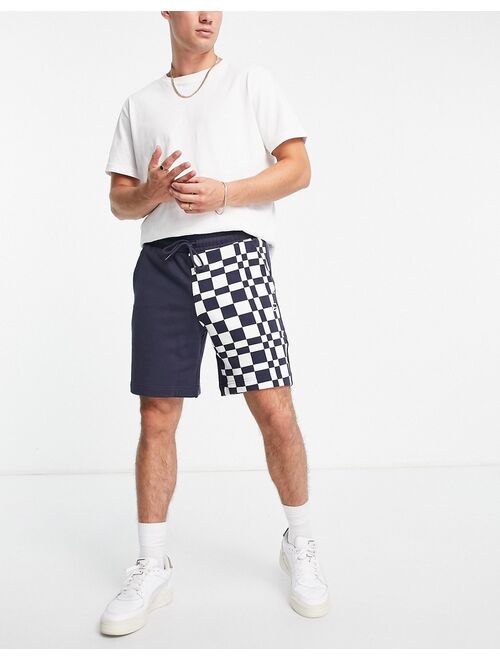 PUMA Downtown shorts in checkerboard color block in navy and white