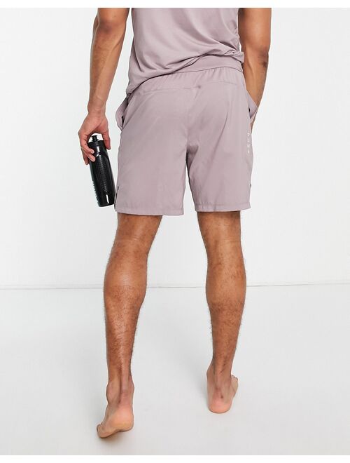 Puma Yoga Studio Yogini 7-inch woven shorts in mauve
