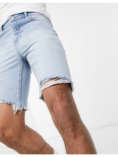 ASOS DESIGN slim denim shorts in light wash blue with raw hem
