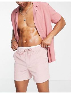 slim shorts in pink cord