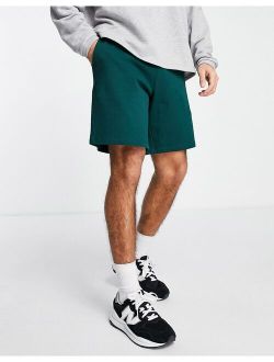 oversized jersey shorts in dark green